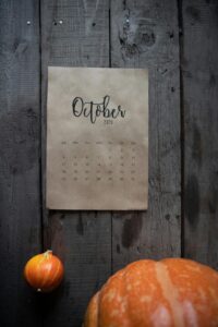 October Calendar on Wooden Wall